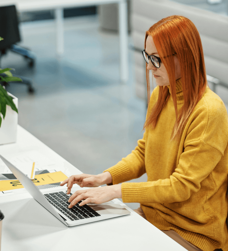 woman using computer in office